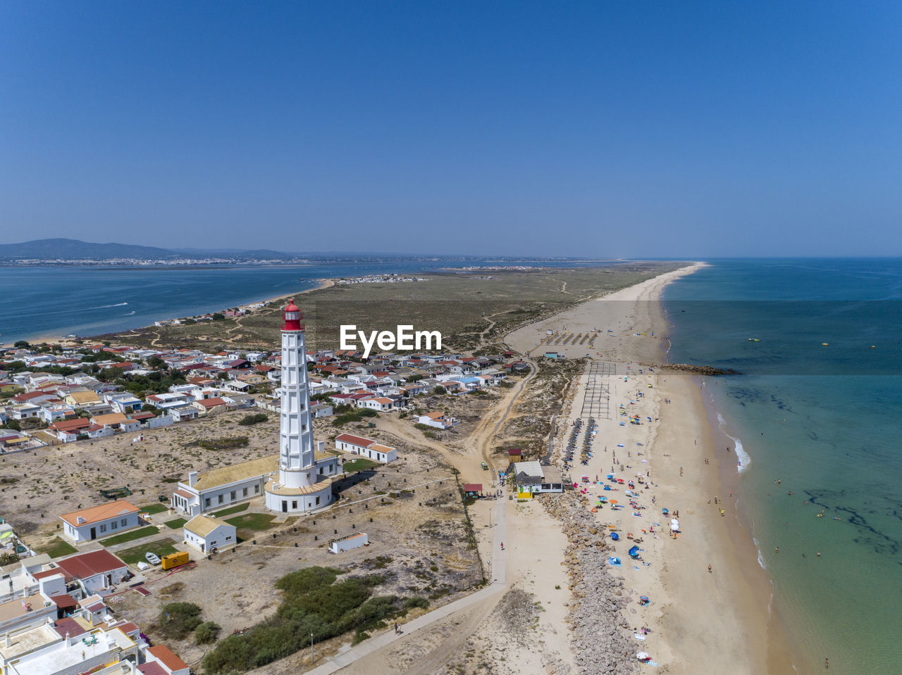 High angle view of beach against clear blue sky