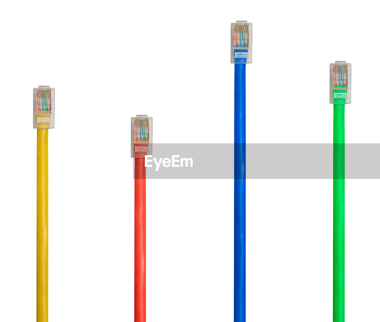 Close-up of network connection plugs against white background