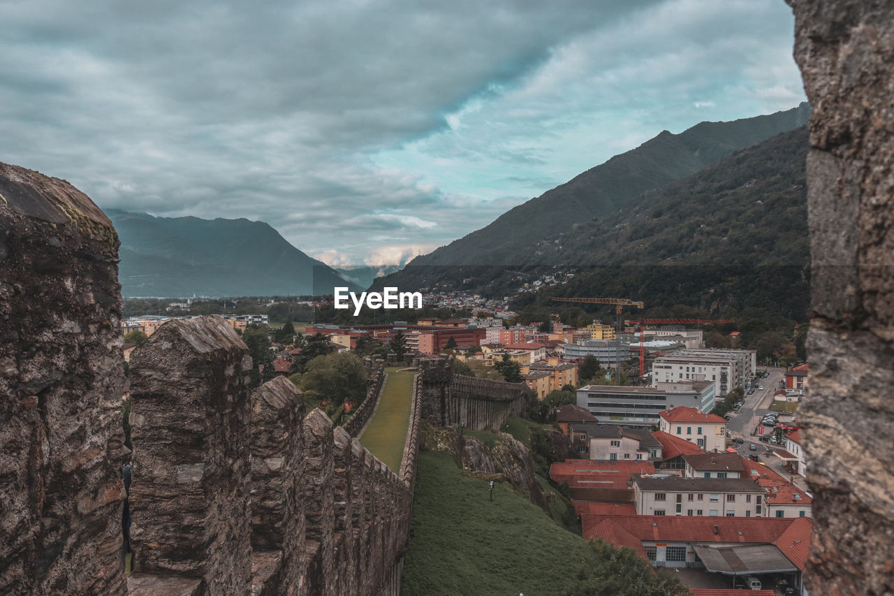 TOWNSCAPE AGAINST MOUNTAIN