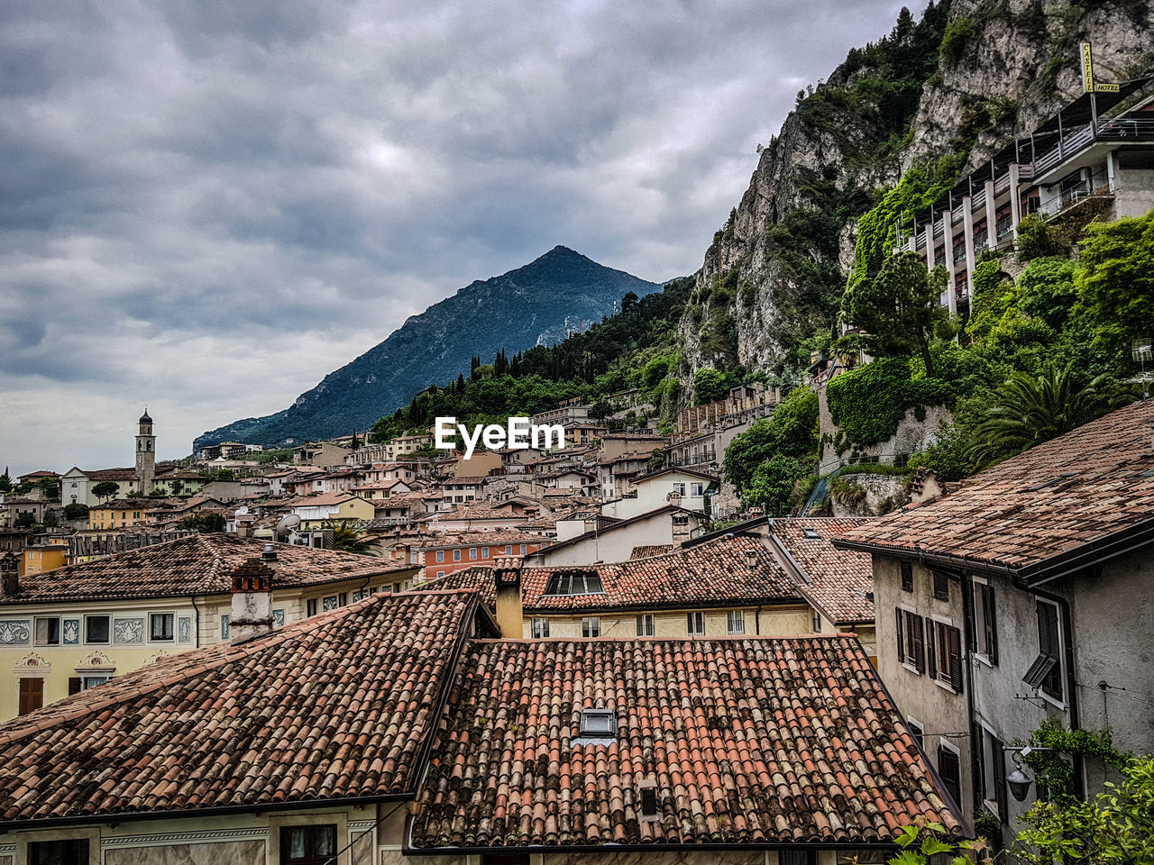 Houses in town against sky