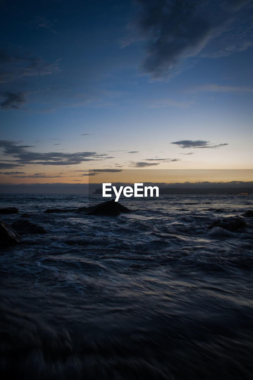 View of sea against cloudy sky