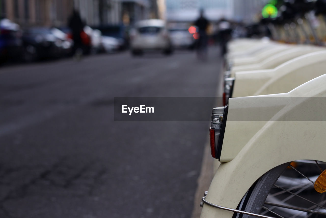 CLOSE-UP OF TRAFFIC ON ROAD