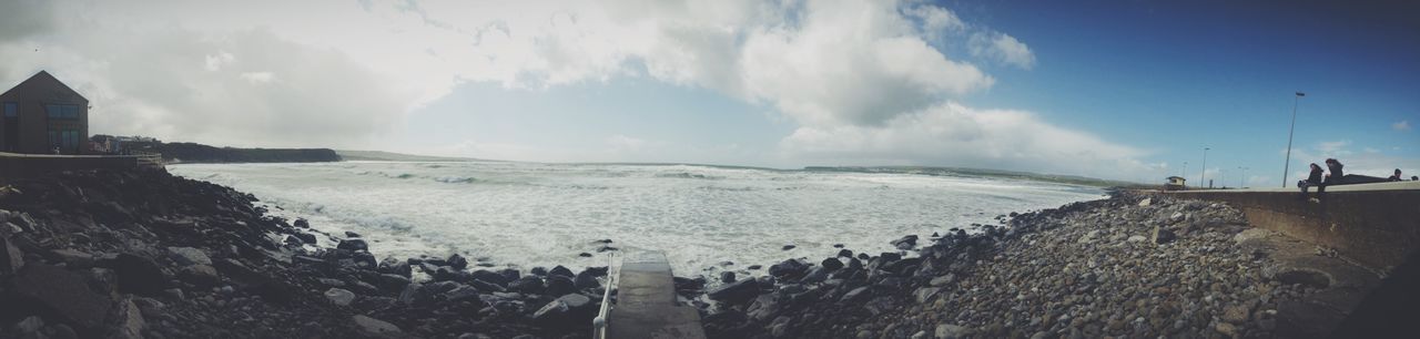 PANORAMIC SHOT OF BEACH AGAINST SKY