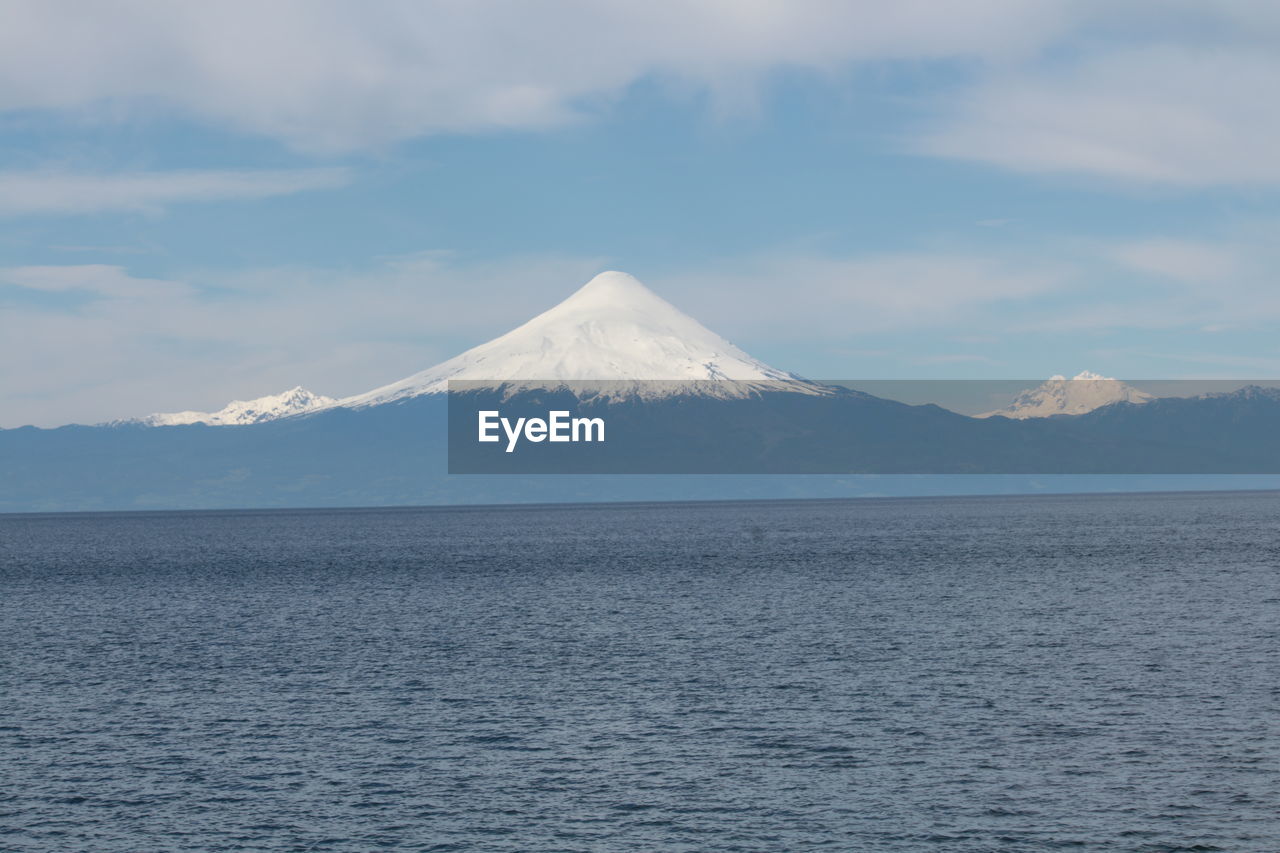 Scenic view of volcanic mountain against sky