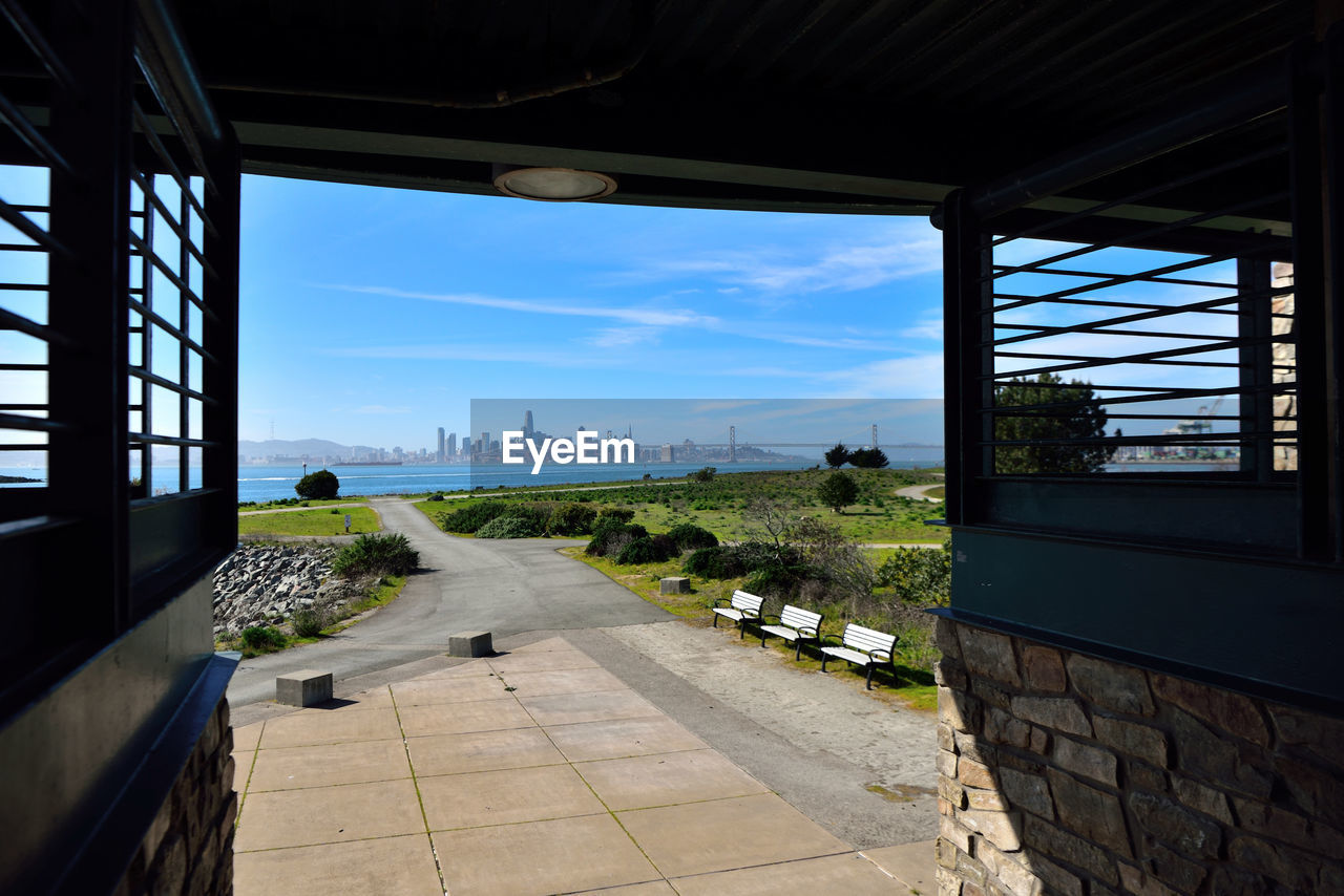 VIEW OF FOOTPATH SEEN THROUGH WINDOW