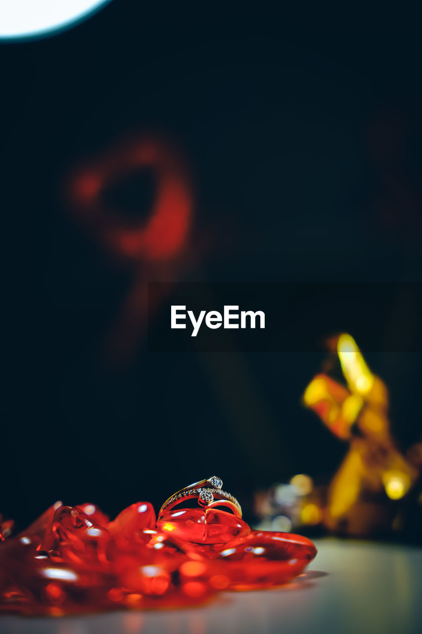 red, macro photography, flower, close-up, indoors, selective focus, food and drink, light, no people, studio shot