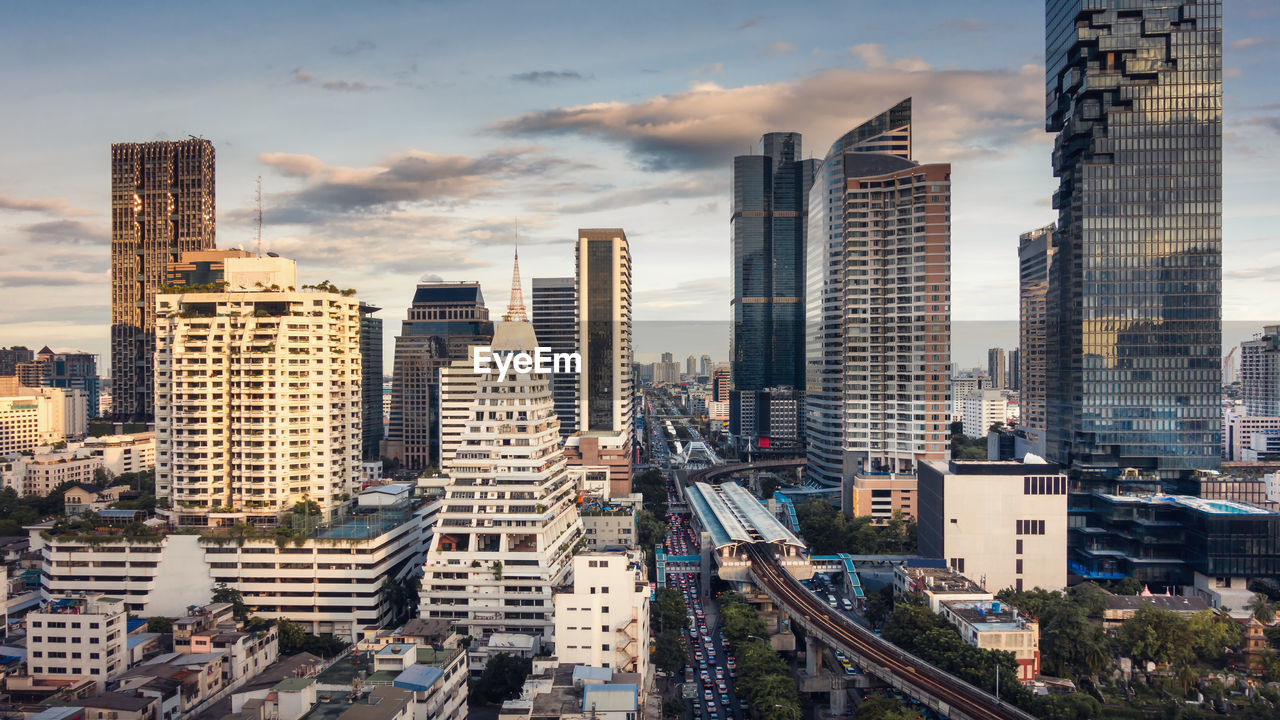 High angle view of buildings in city against sky