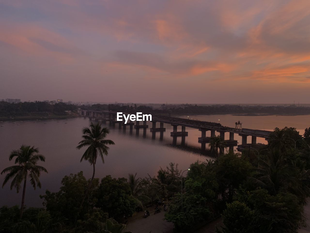 Scenic view of bridge against sky during sunset