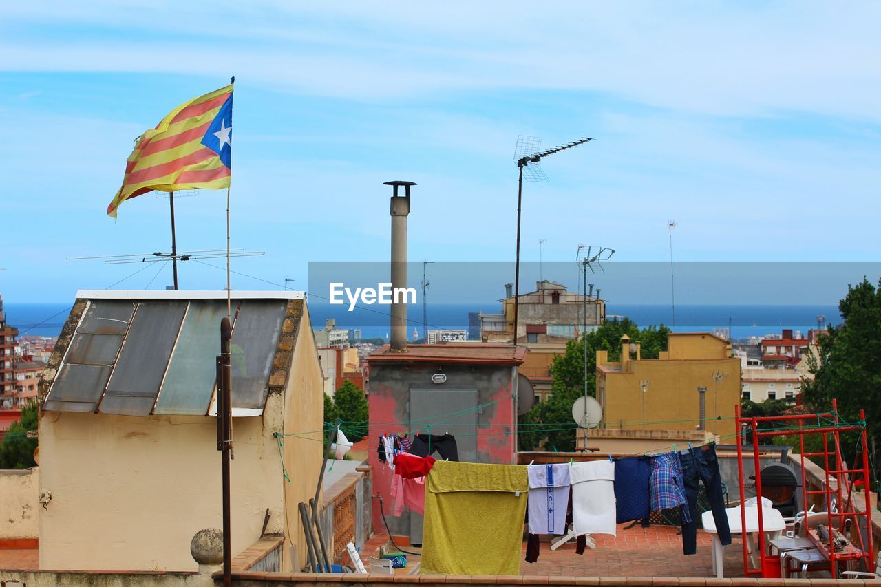 Catalonia flag waving on building terrace