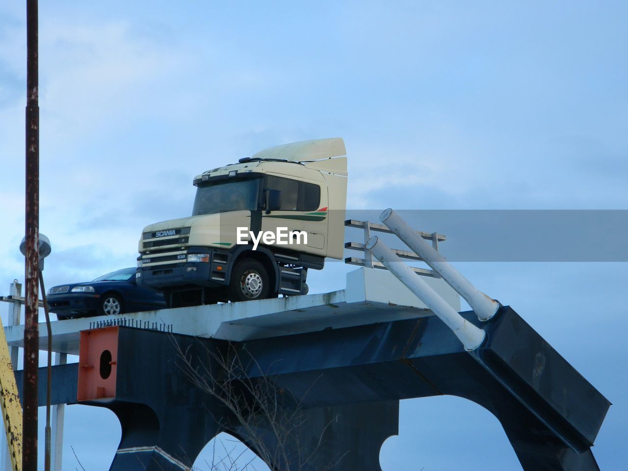 LOW ANGLE VIEW OF TRUCK AGAINST SKY