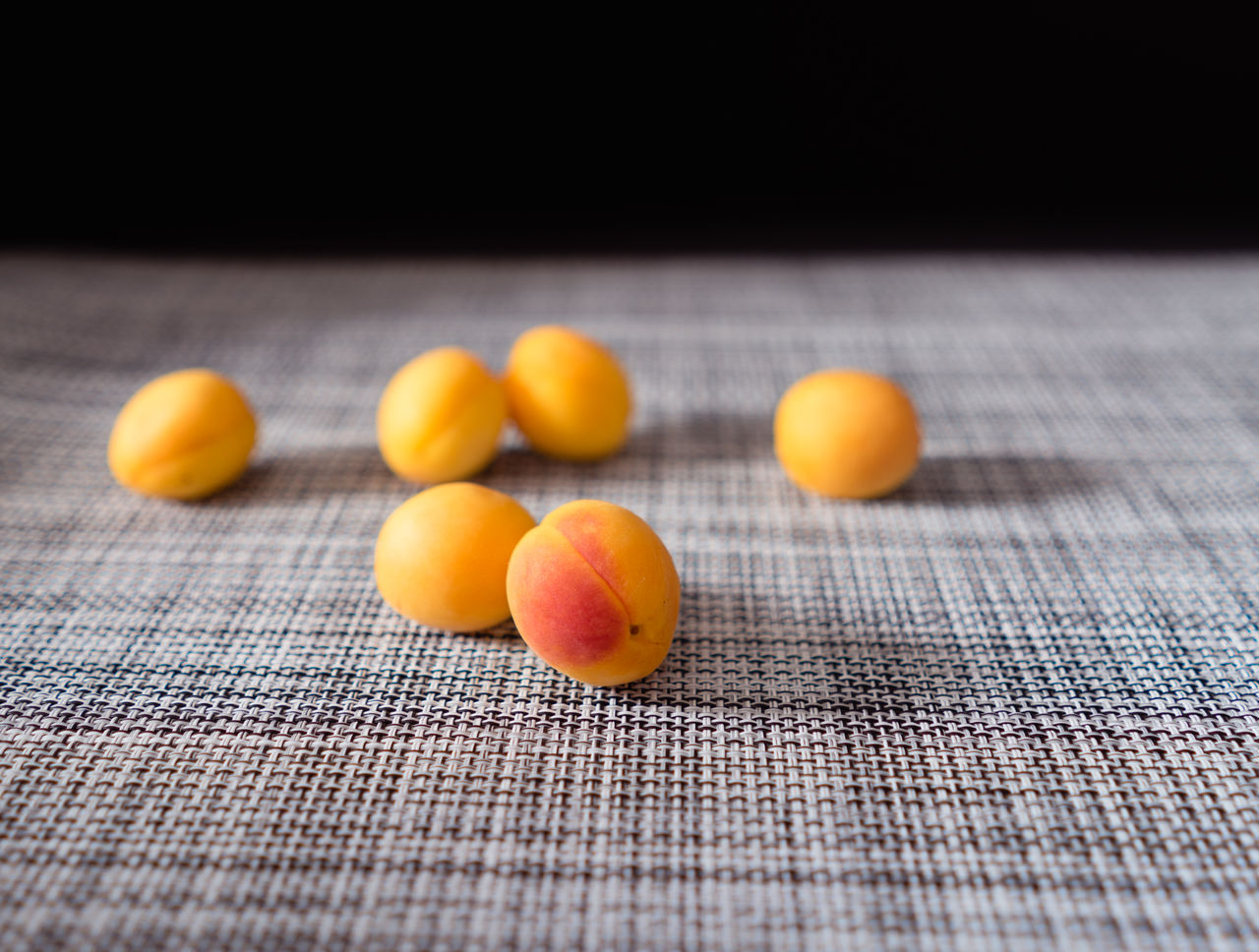 CLOSE-UP OF YELLOW AND VEGETABLES ON TABLE