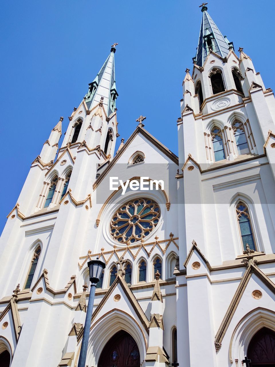LOW ANGLE VIEW OF BELL TOWER AT CATHEDRAL