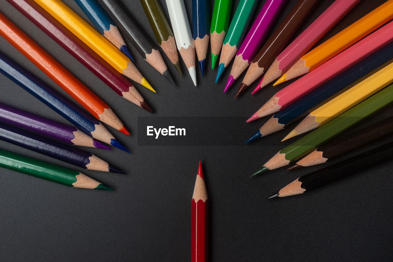 HIGH ANGLE VIEW OF COLORED PENCILS