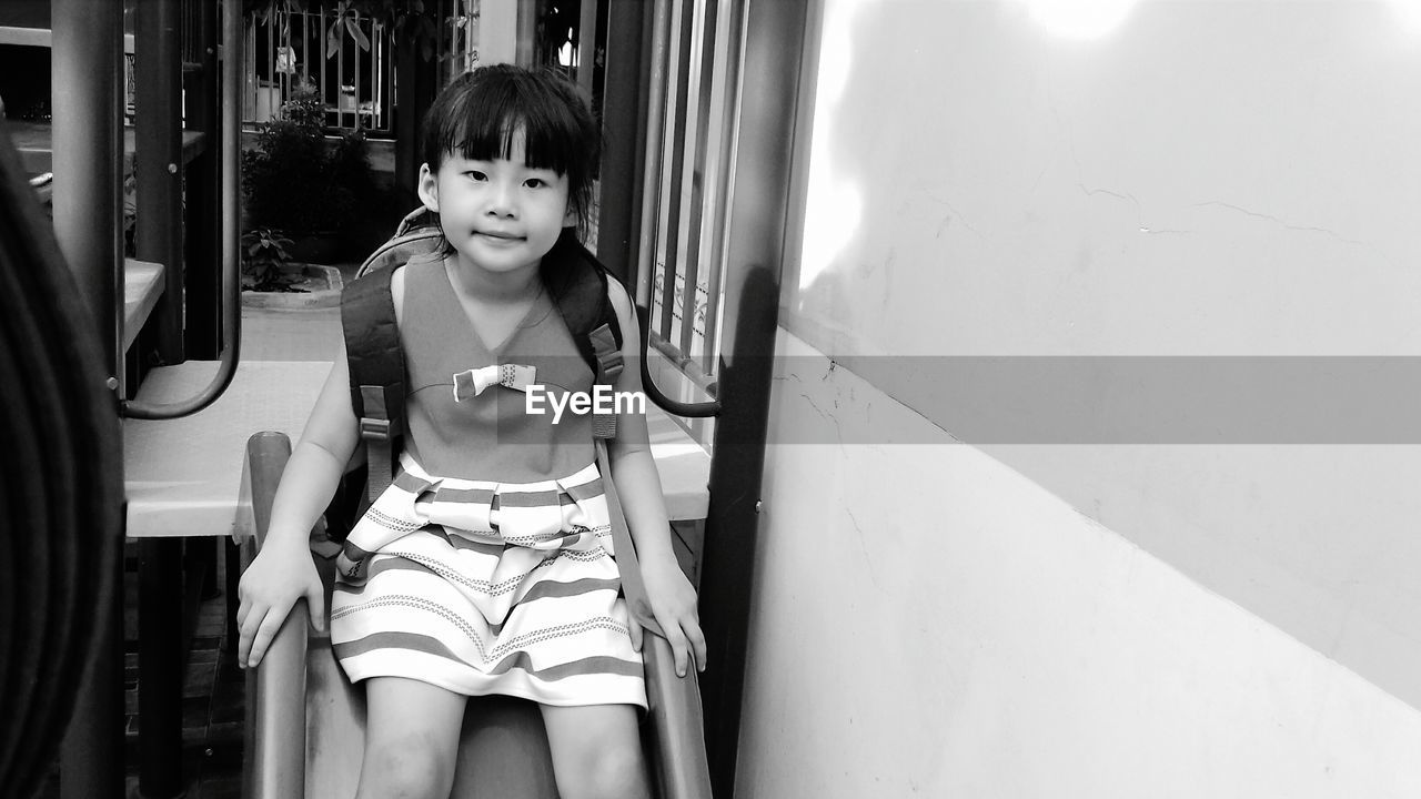 Portrait of girl on slide