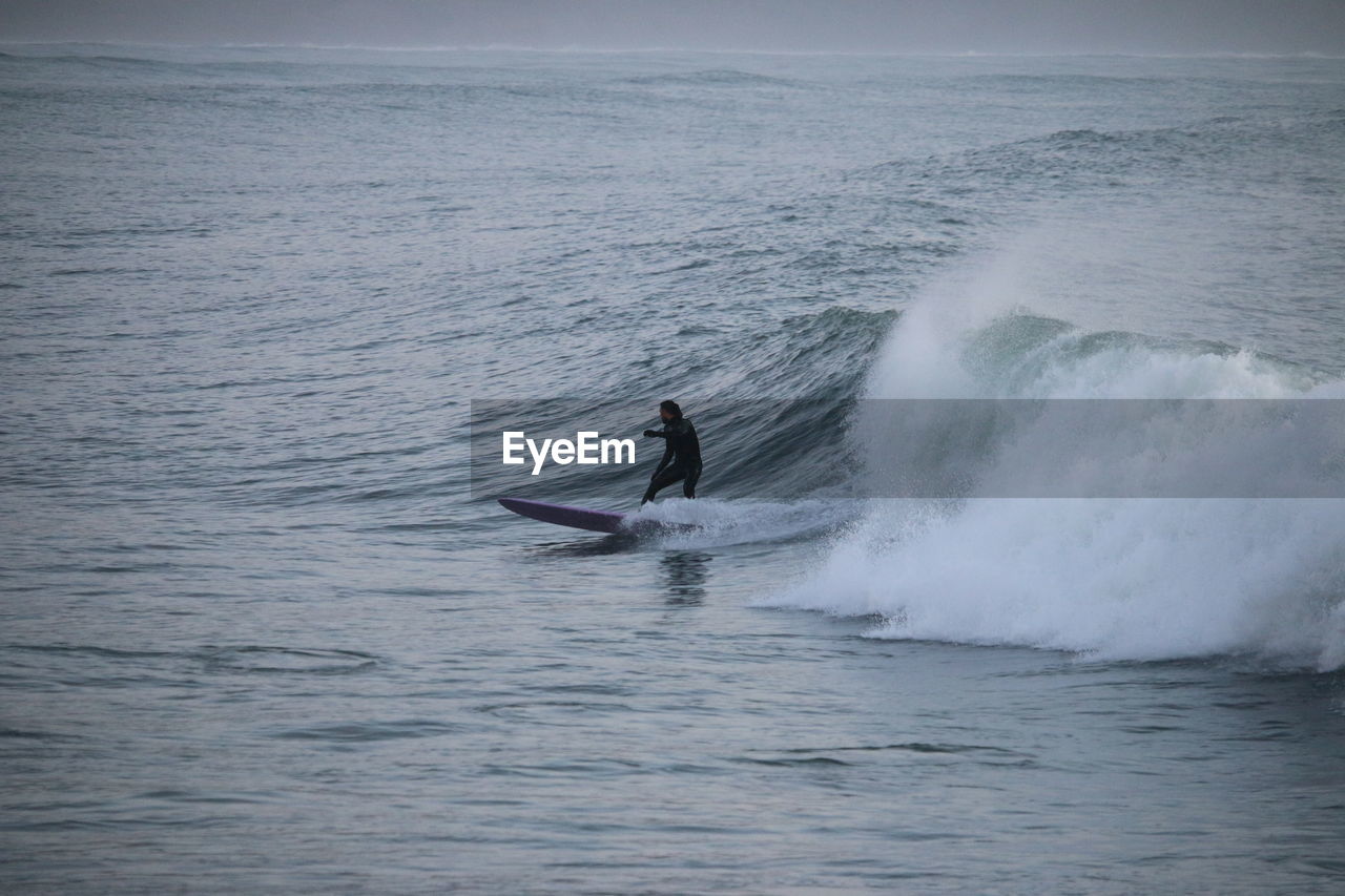 Man surfing in ocean 