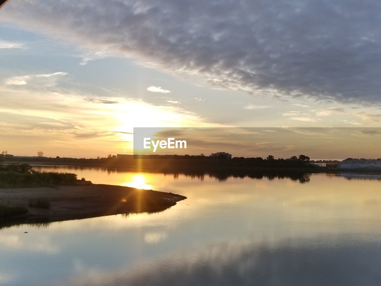 LAKE AGAINST SKY DURING SUNSET