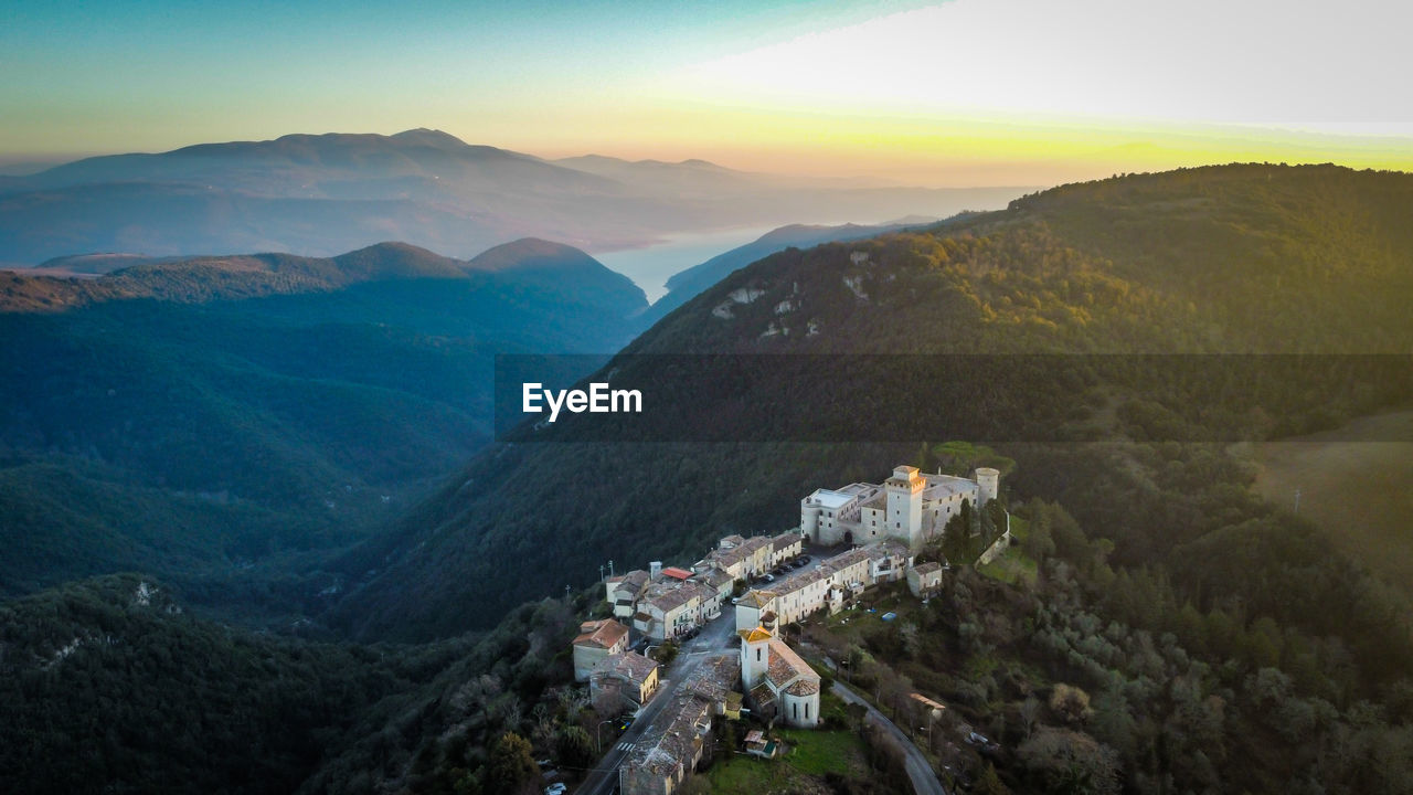 Scenic view of mountains against sky during sunset