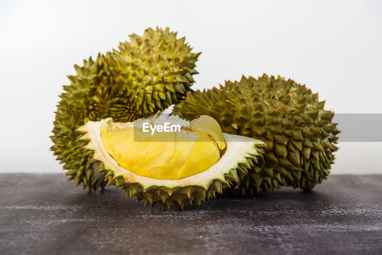 CLOSE-UP OF FRUITS ON TABLE