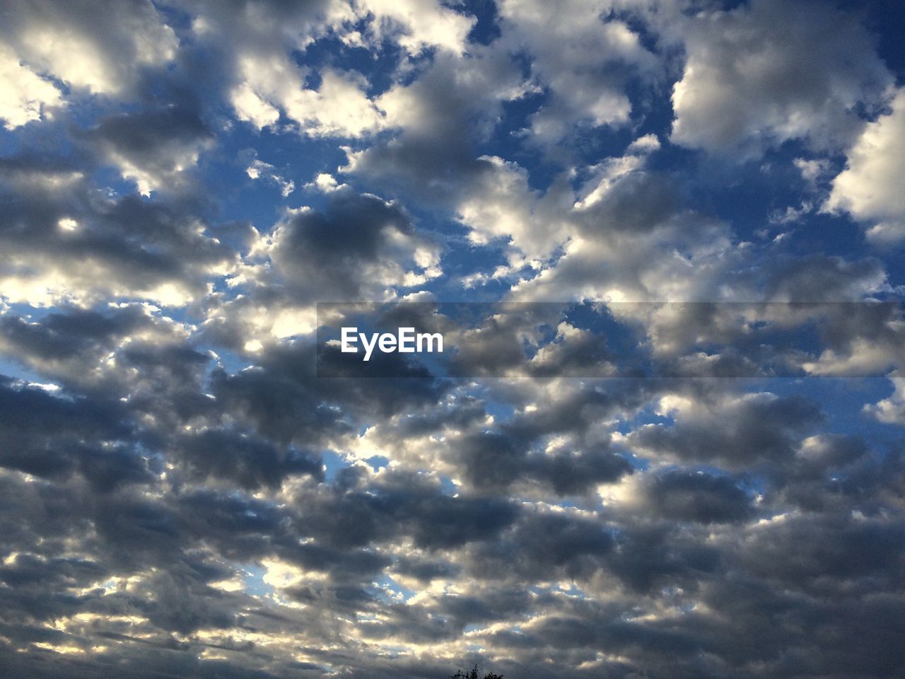 LOW ANGLE VIEW OF CLOUDY SKY OVER WHITE CLOUDS