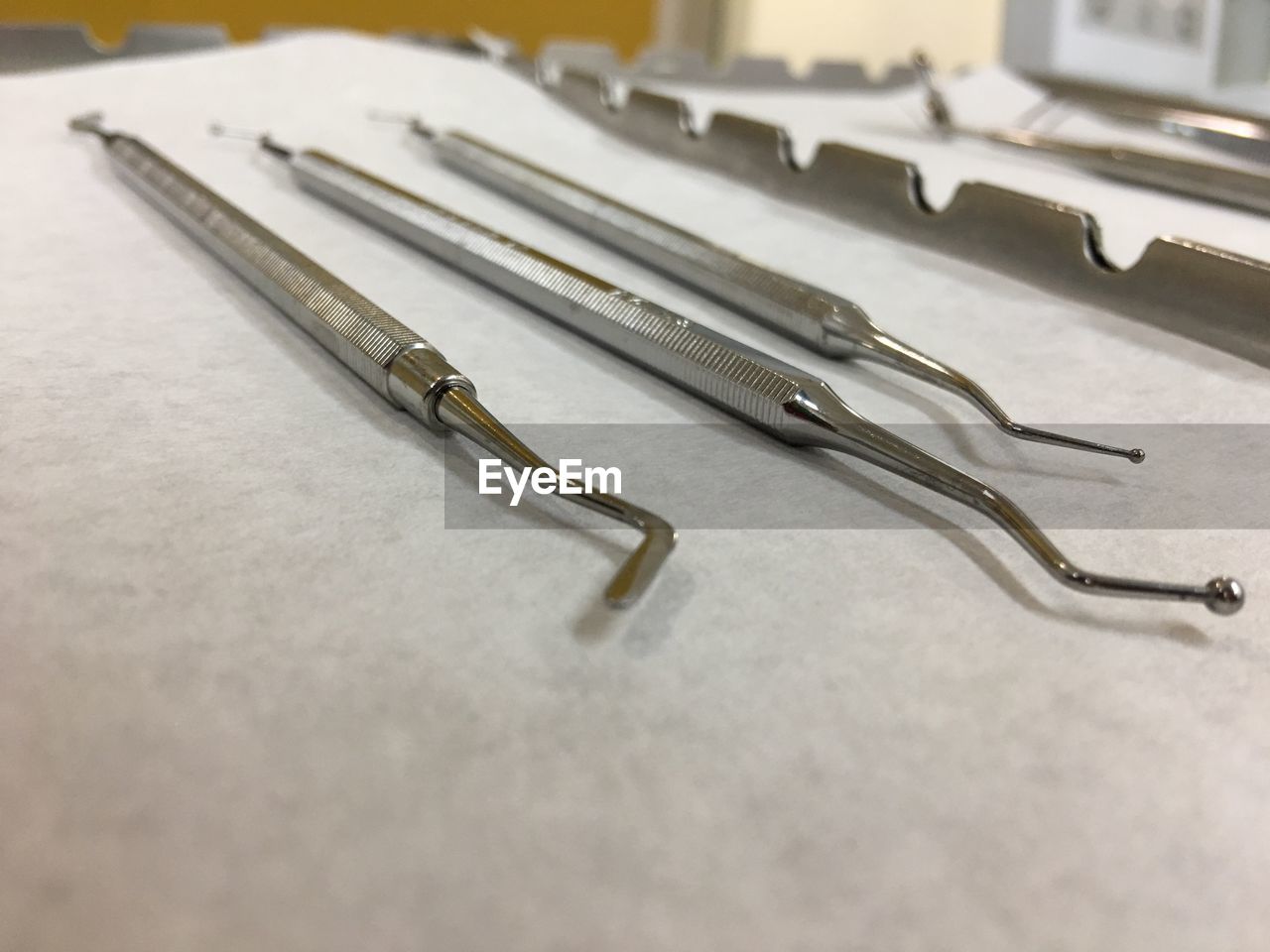 Close-up of dental equipment on table