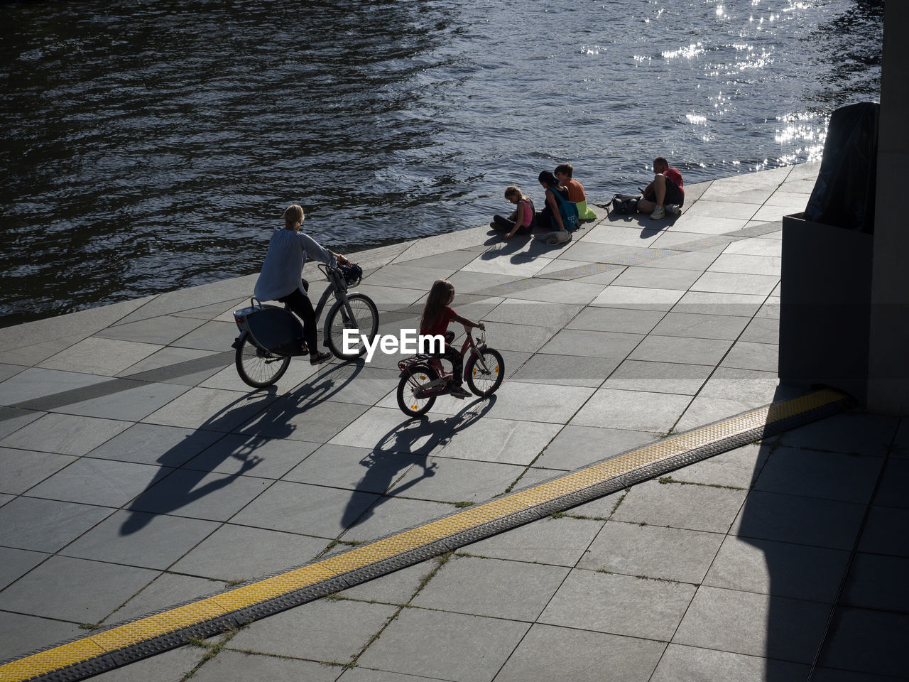 High angle view of people riding bicycle in city berlin