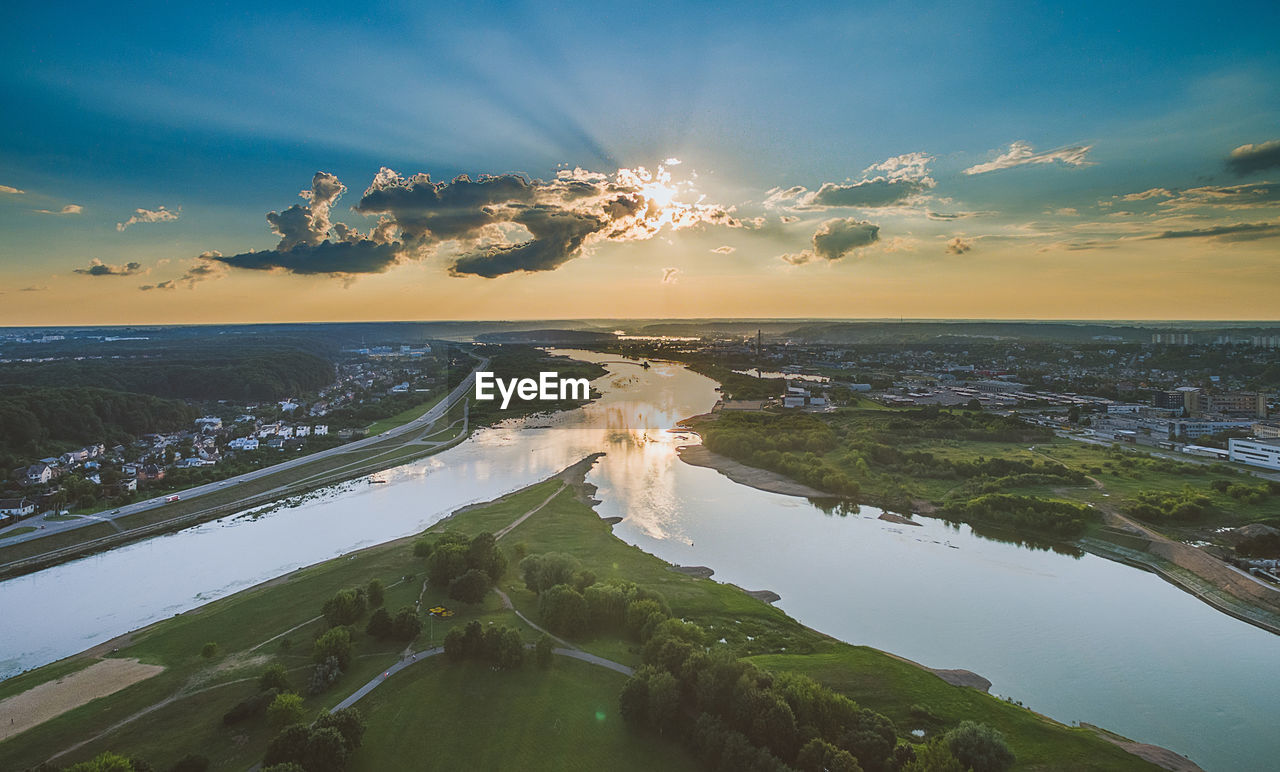 High angle view of nevezis and cityscape during sunset