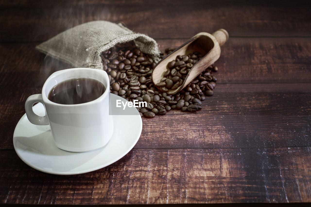 High angle view of coffee cup on table