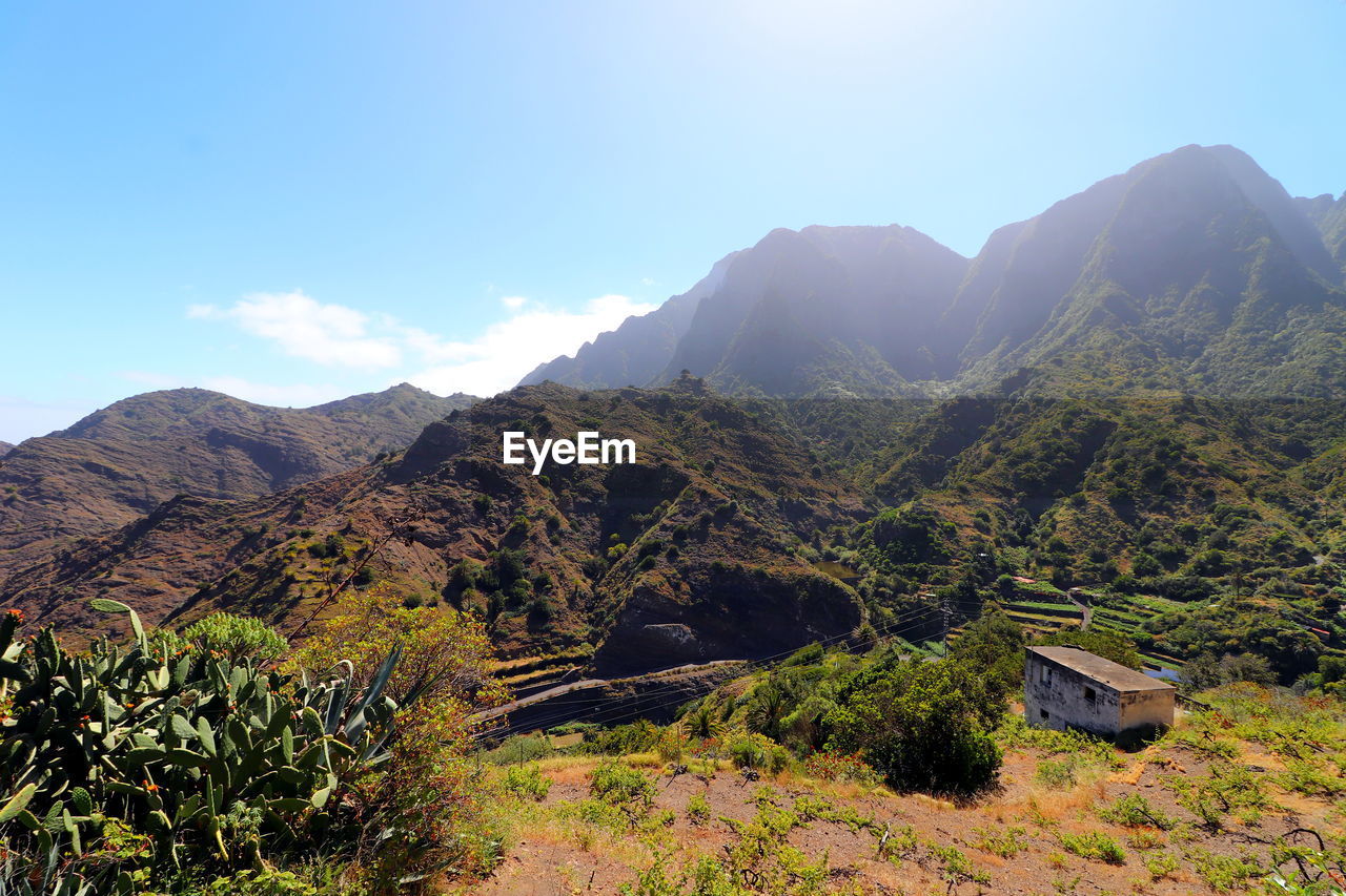 SCENIC VIEW OF MOUNTAIN AGAINST SKY