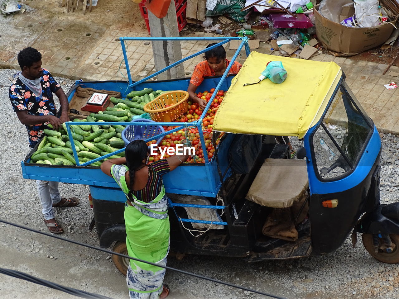 HIGH ANGLE VIEW OF MAN FOR SALE AT MARKET