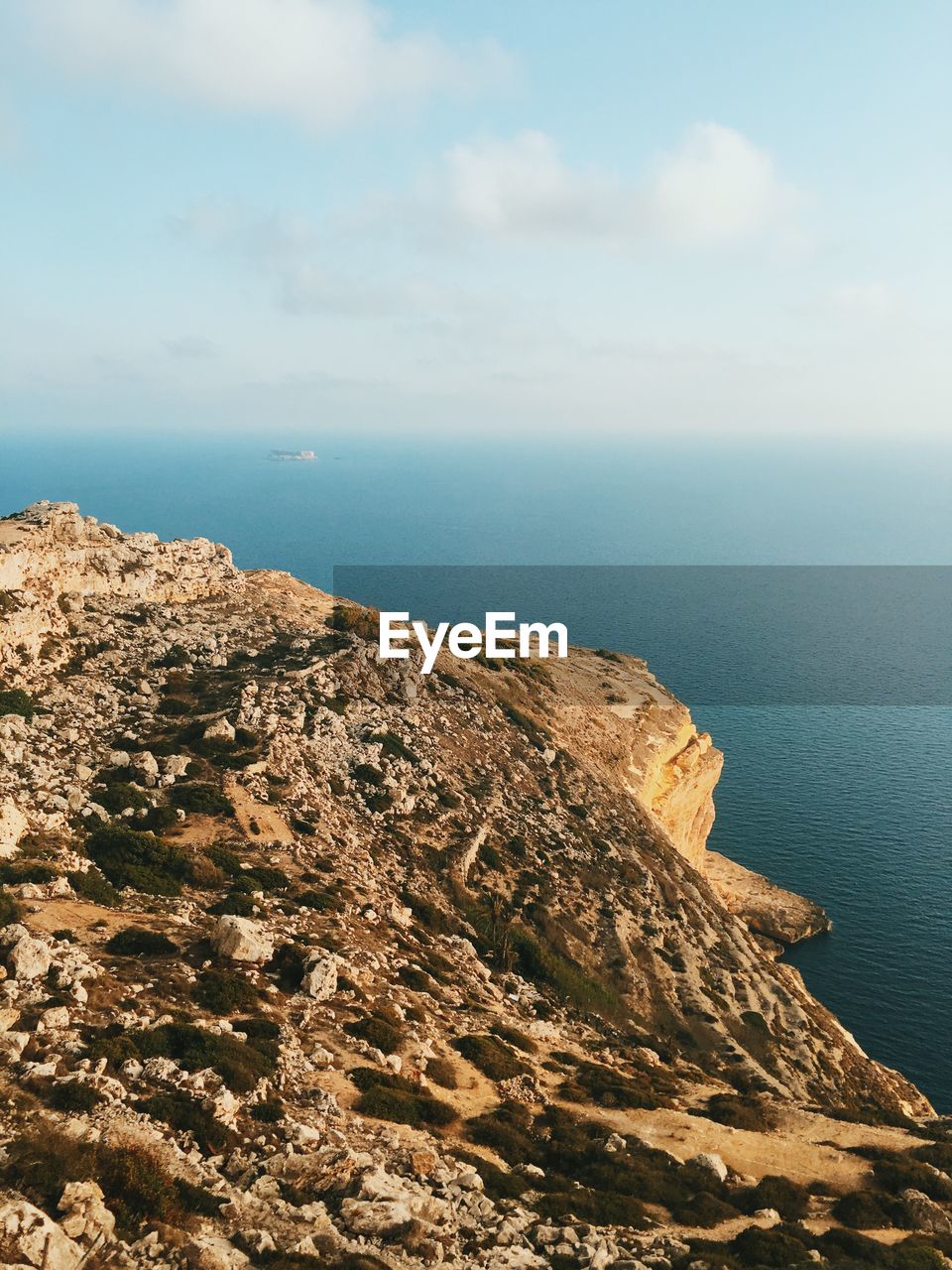 View of calm blue sea against the sky