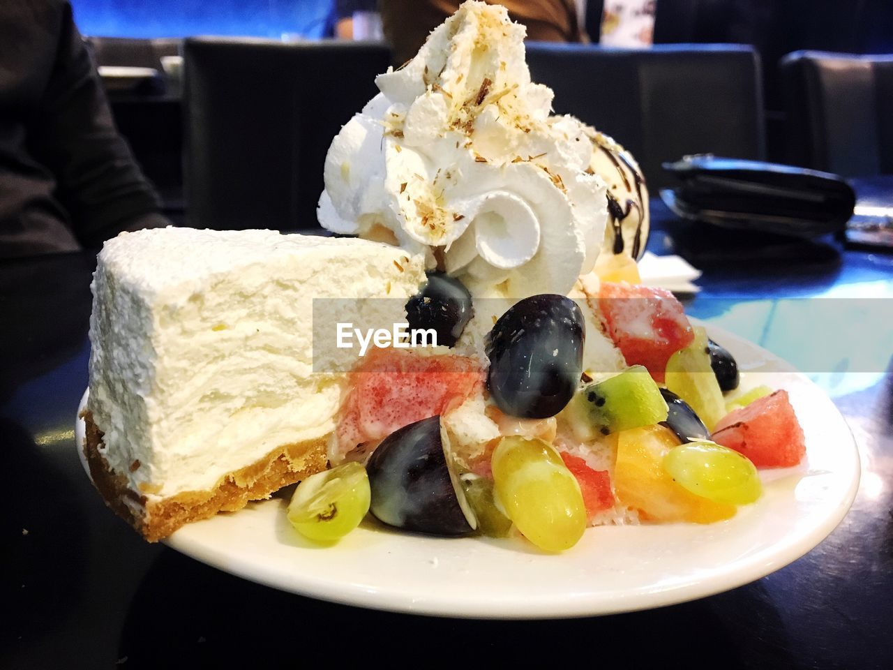 CLOSE-UP OF DESSERT SERVED IN PLATE WITH FRUITS