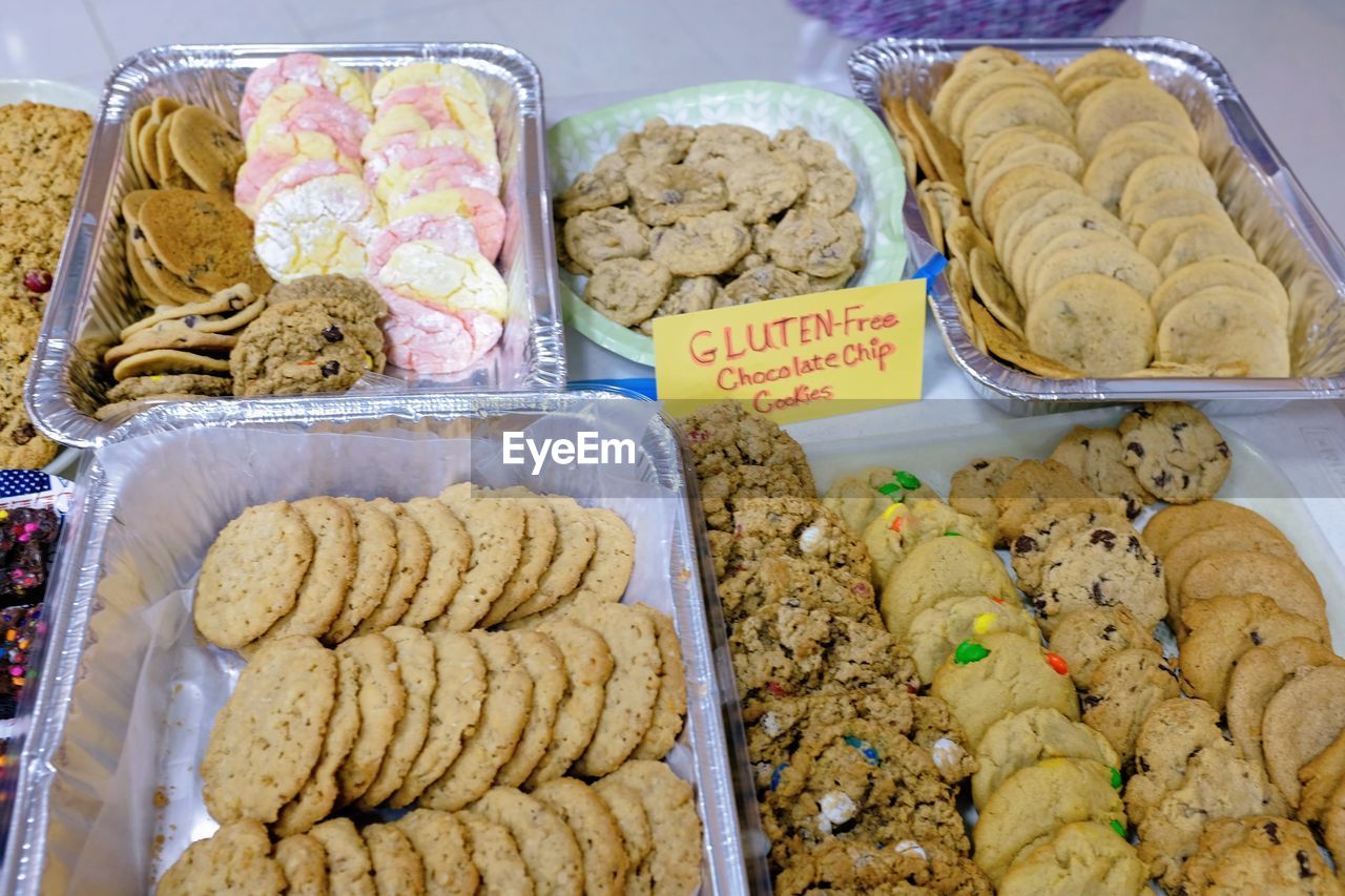 HIGH ANGLE VIEW OF COOKIES FOR SALE AT MARKET