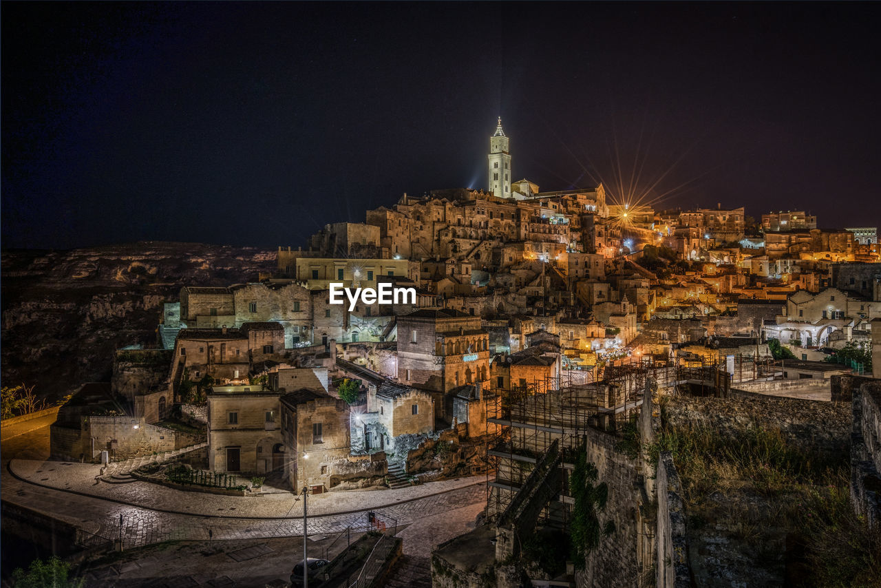 Beautiful night cityscape of matera with the cathedral in the highest point of the city, basilicata