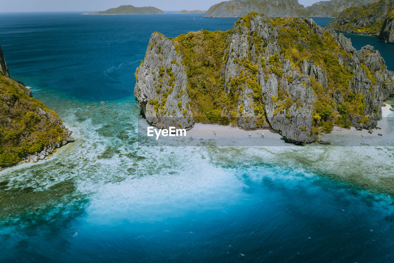 High angle view of rocks in sea