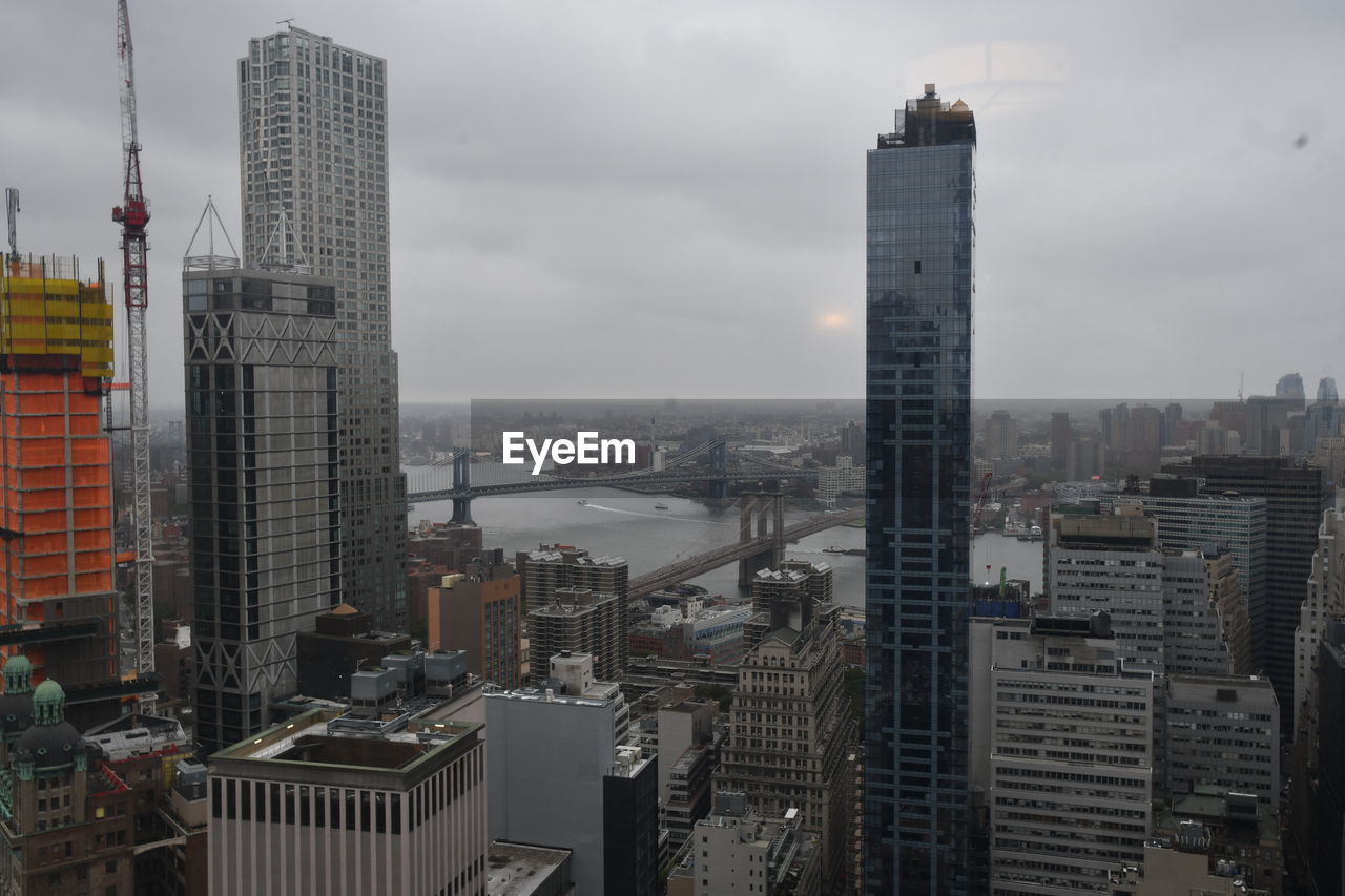 MODERN BUILDINGS IN CITY AGAINST SKY