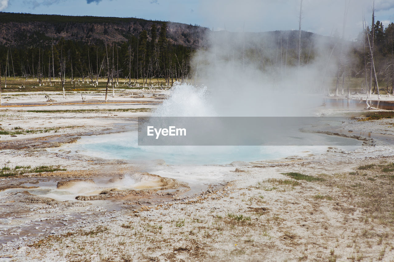 Scenic view of hot springs at yellowstone national park