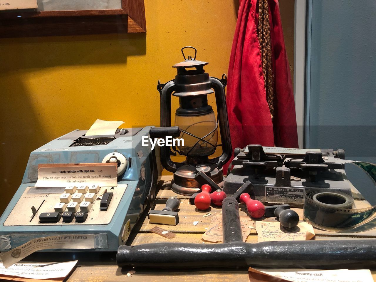 Close-up of old-fashioned technologies on table