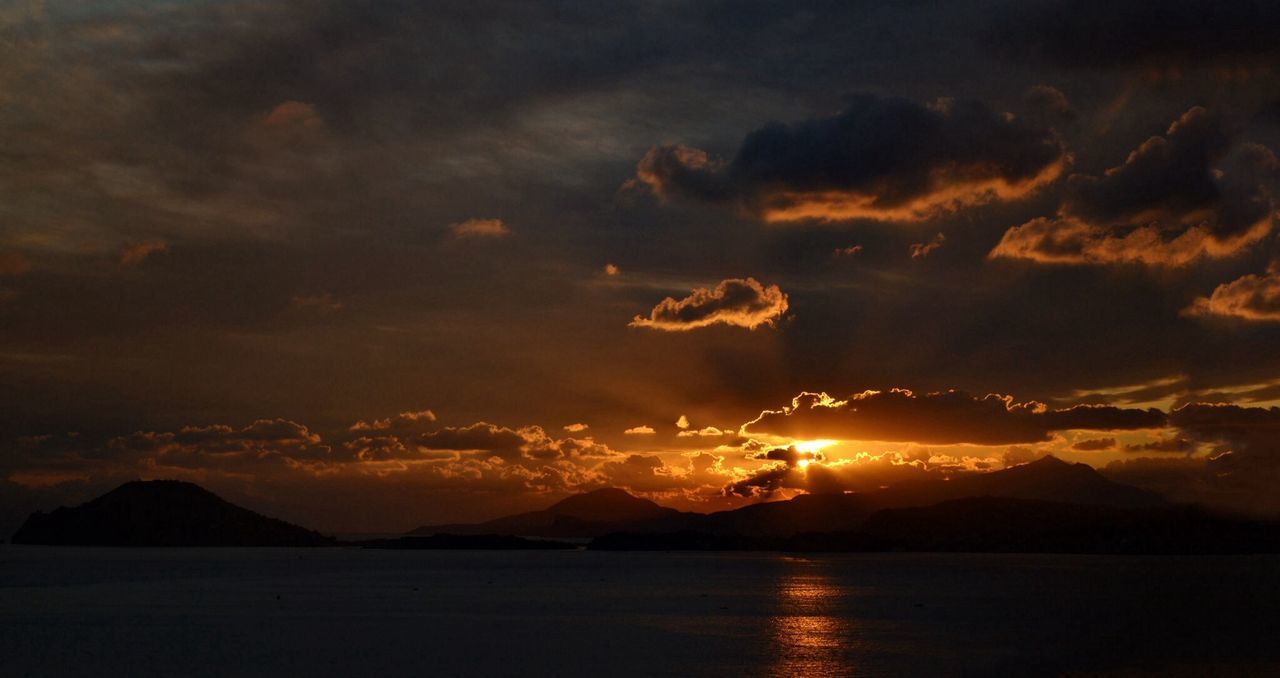 Scenic sunset over mountain lake