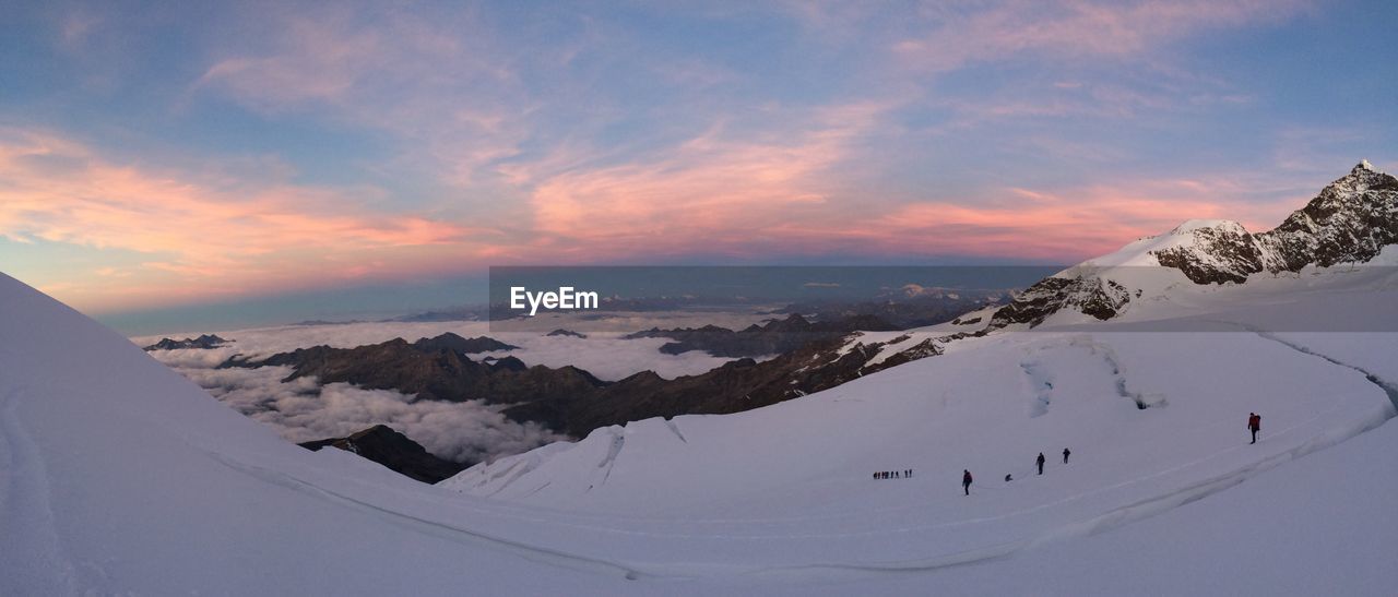 Scenic view of snow covered mountains