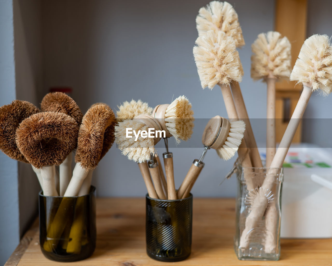 CLOSE-UP OF FLOWERS IN VASE ON TABLE