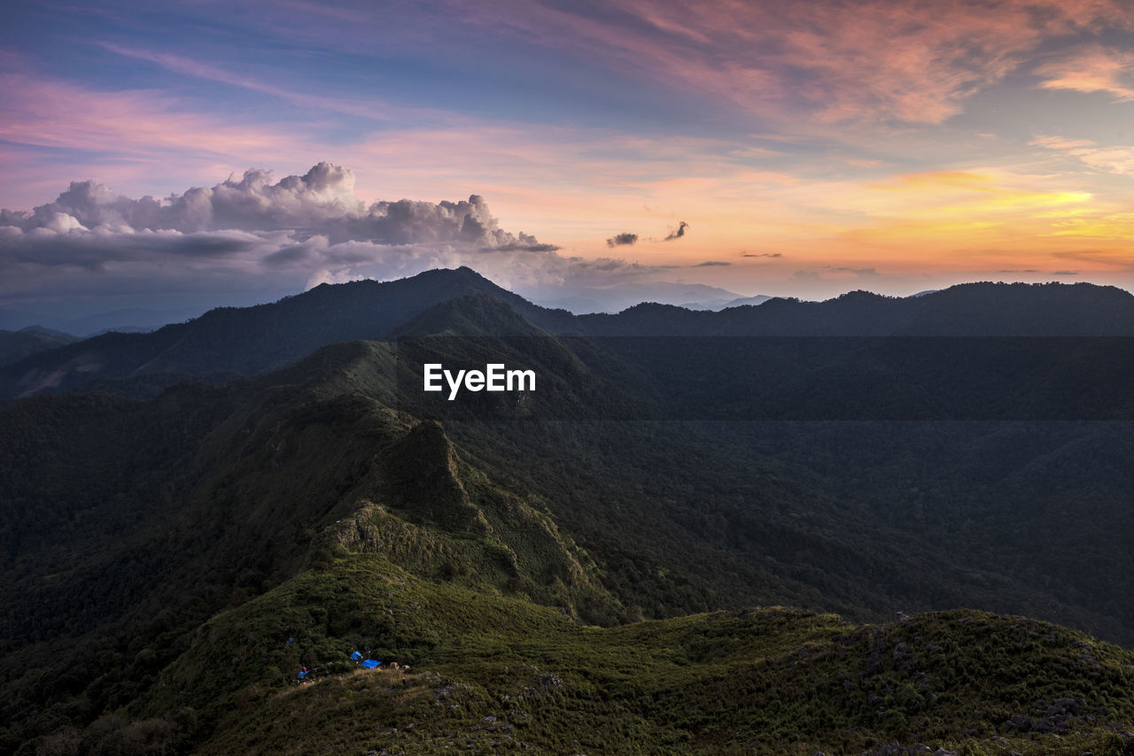 Scenic view of mountains against sky during sunset