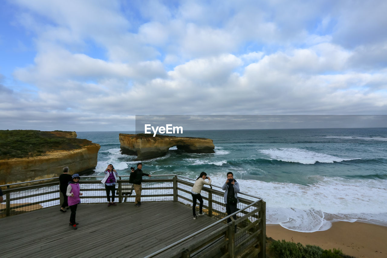 GROUP OF PEOPLE ON BEACH