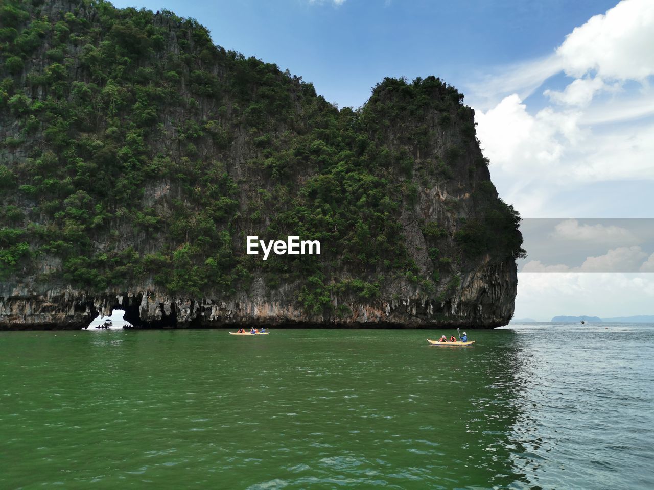 SCENIC VIEW OF SEA AND ROCKS AGAINST SKY