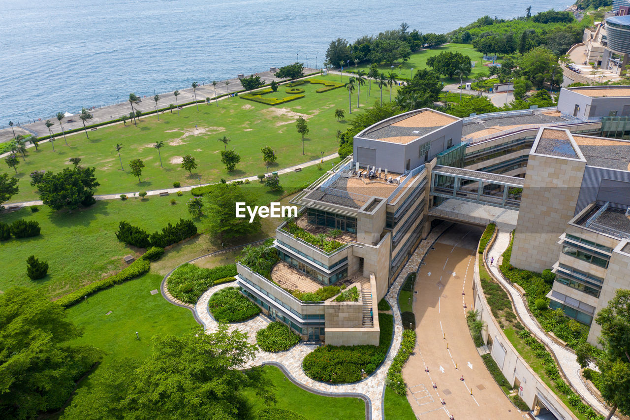 HIGH ANGLE VIEW OF TREES AND BUILDINGS