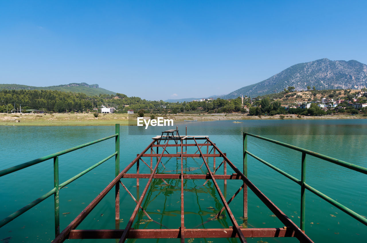 Scenic view of sea against blue sky