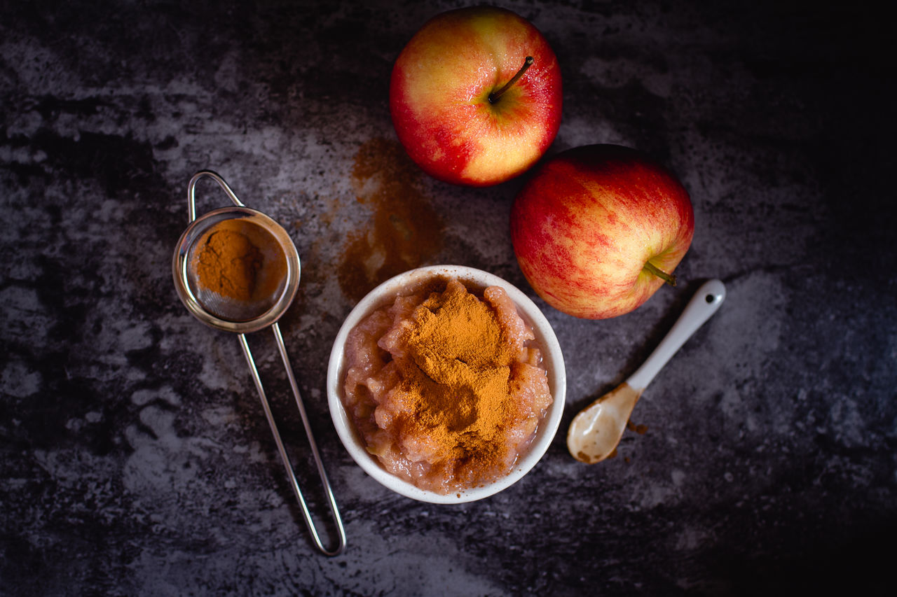 HIGH ANGLE VIEW OF BREAKFAST ON TABLE AGAINST BLACK BACKGROUND