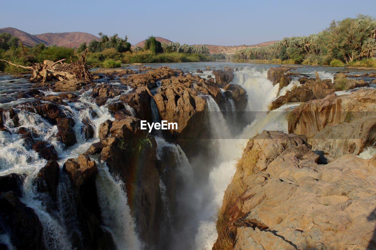 Scenic view of epupa falls against sky