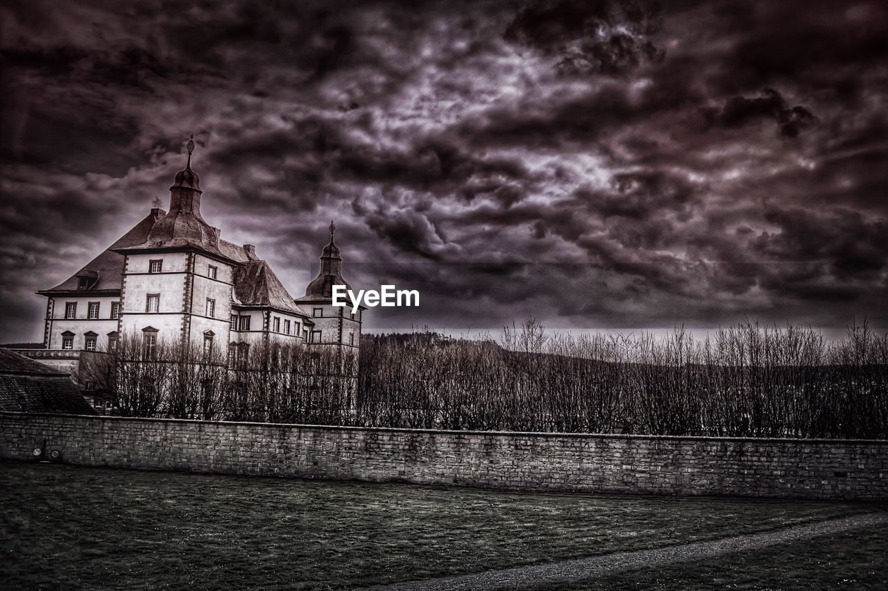 CLOUDY SKY OVER BUILDINGS