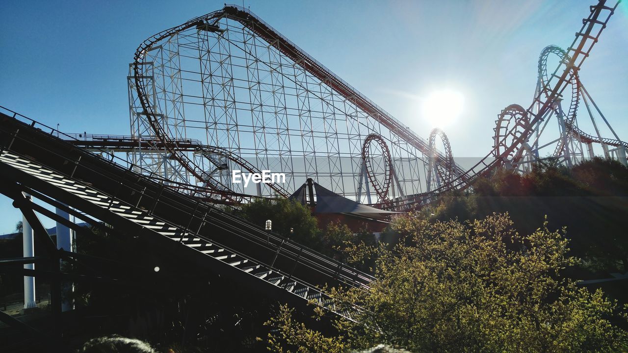 LOW ANGLE VIEW OF ROLLERCOASTER