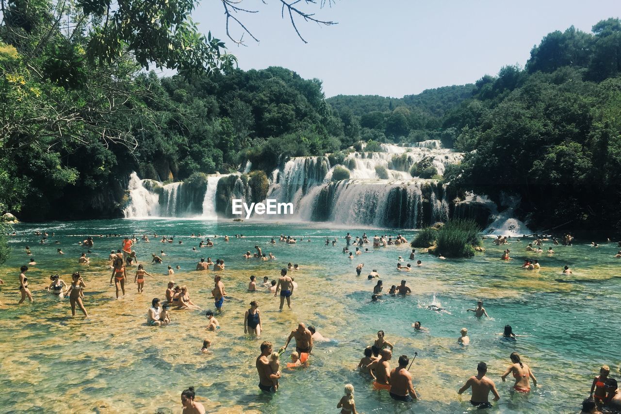 People enjoying in river at krka national park